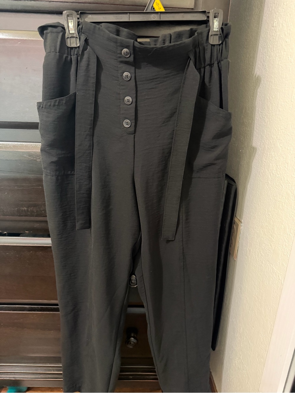 Soho black lounge pants with button detail, size M